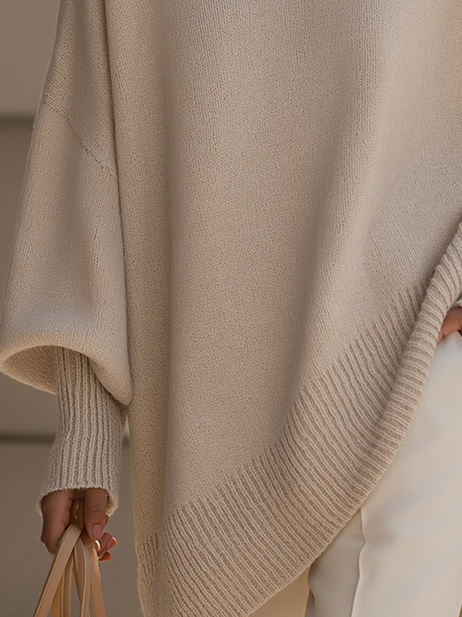 Pull oversize femme Jeanne de Danoir Paris, coupe fluide, porté avec col en V et manches longues, tissu doux et confortable.