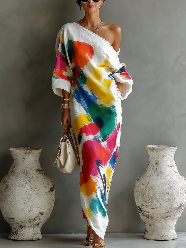 Robe longue THEA Danoir Paris, robe maxi élégante en tissu fluide, portée avec des détails raffinés, vue de face.