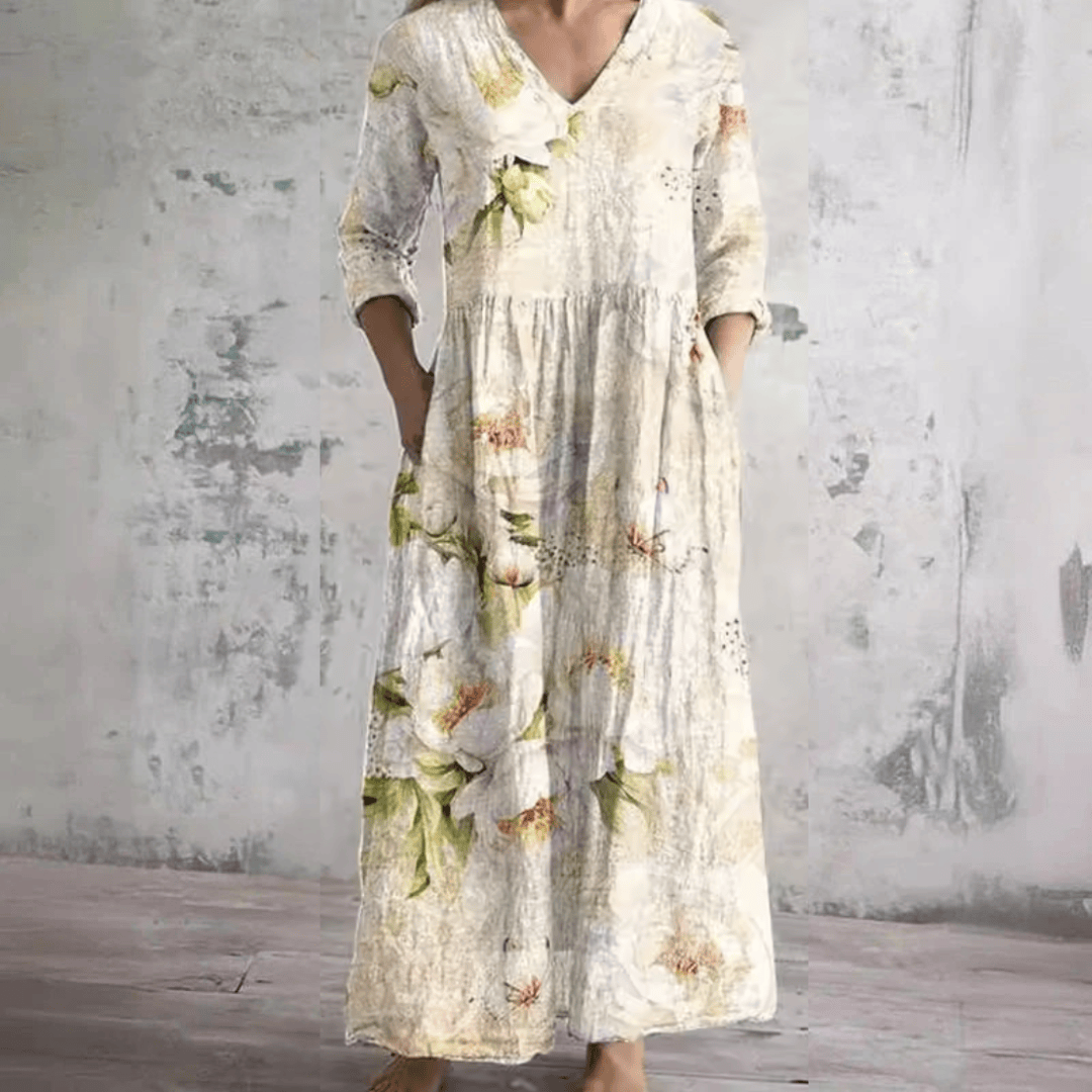 Robe d'été florale Anne™ de Danoir Paris avec manches courtes, motif coloré et coupe légère pour femme.