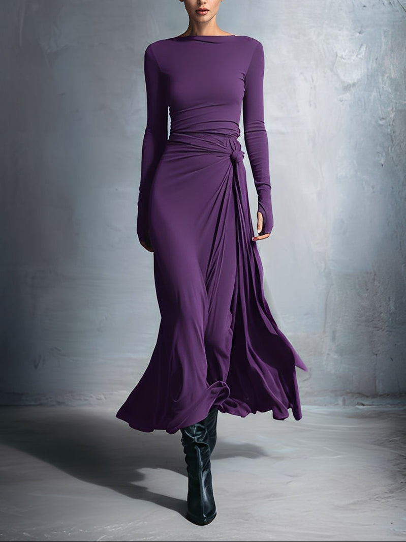 Robe maxi Naomie de Danoir Paris avec nœud latéral, robe longue élégante en tissu fluide, portée avec style.