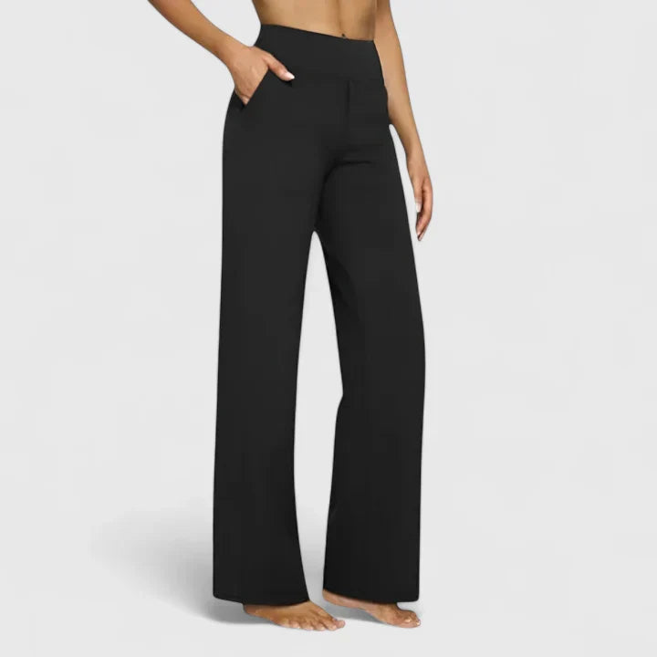 Pantalons élégants Danoir Paris Ame, coupe moderne en tissu noir avec détails sophistiqués, vue de face.