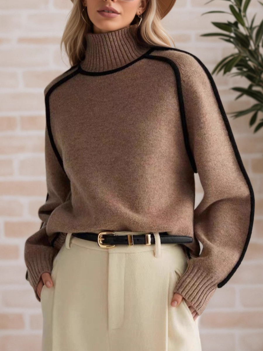 Pull élégant à col haut Donna de Danoir Paris, vêtement d'automne en laine douce, porté sur un mannequin.