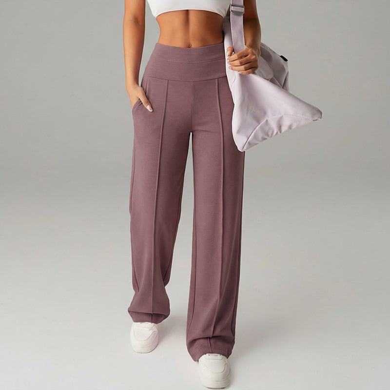 Pantalon femme à jambes larges et droites, taille haute, tissu extensible, en tissu noir, de la marque Danoir Paris.