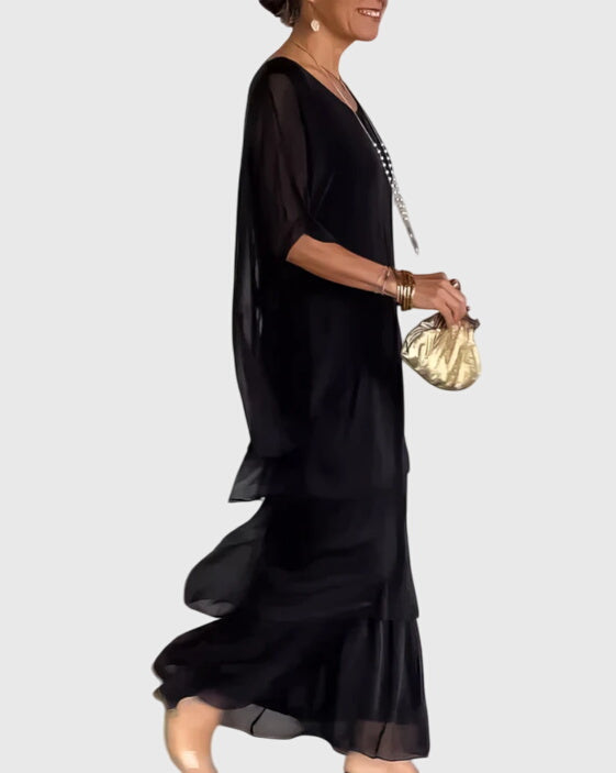 Robe longue Susan de Danoir Paris, vêtement élégant en tissu fluide, portée avec style et sophistication.