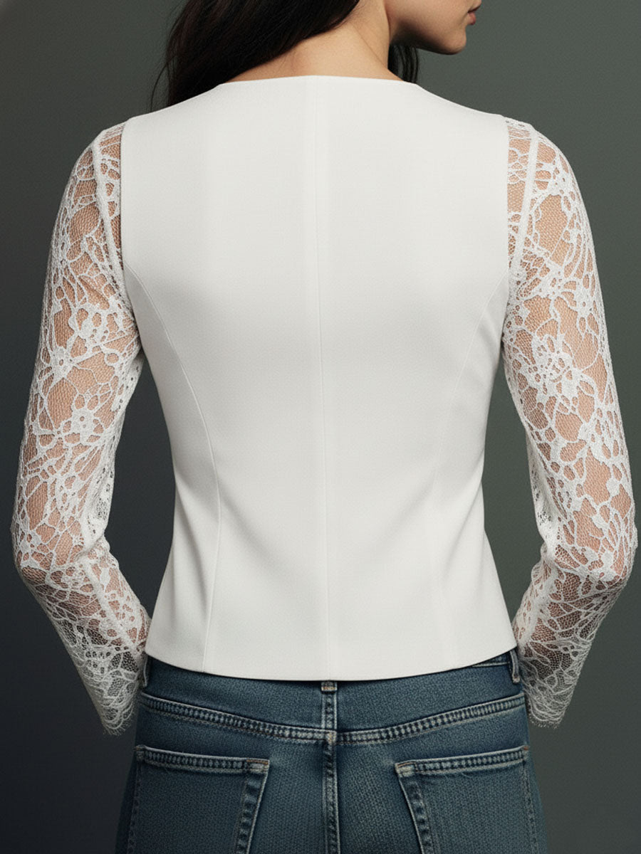 Blazer noir Noémie de Danoir Paris avec manches semi-transparentes, porté sur un modèle, style élégant et moderne.