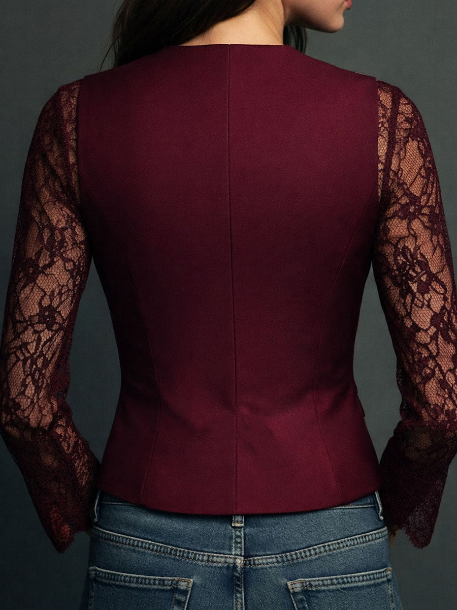 Blazer noir Danoir Paris Noémie avec manches semi-transparentes, coupe élégante et détails modernes, porté sur mannequin.