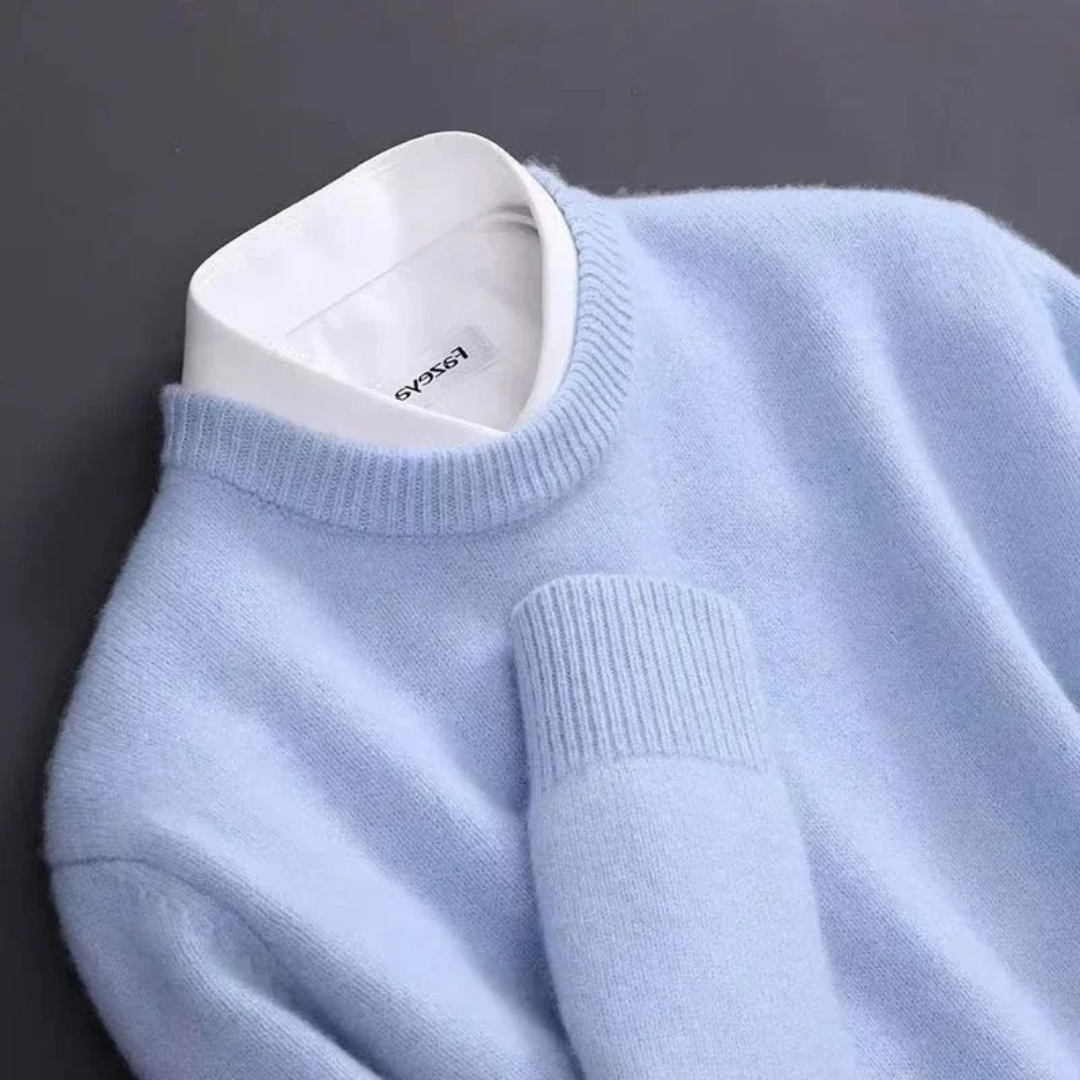 Pull en cachemire élégant Henri de Danoir Paris, couleur azur, avec un style sophistiqué et finition raffinée.