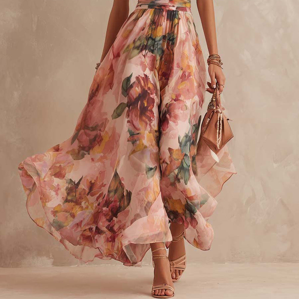 Robe longue femme Aurora de Danoir Paris, monospaule florale avec détails élégants, vue en gros plan sur le tissu et la finition.