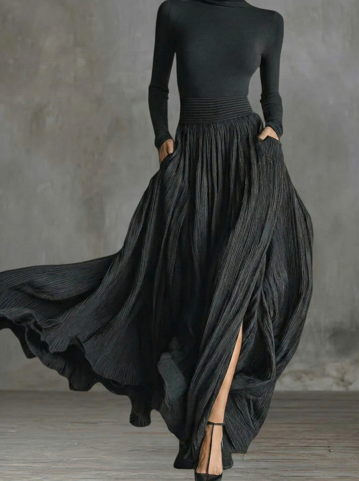 Robe maxi taille haute Rachel de Danoir Paris, robe longue élégante avec coupe fluide et détails sophistiqués, portée en image.