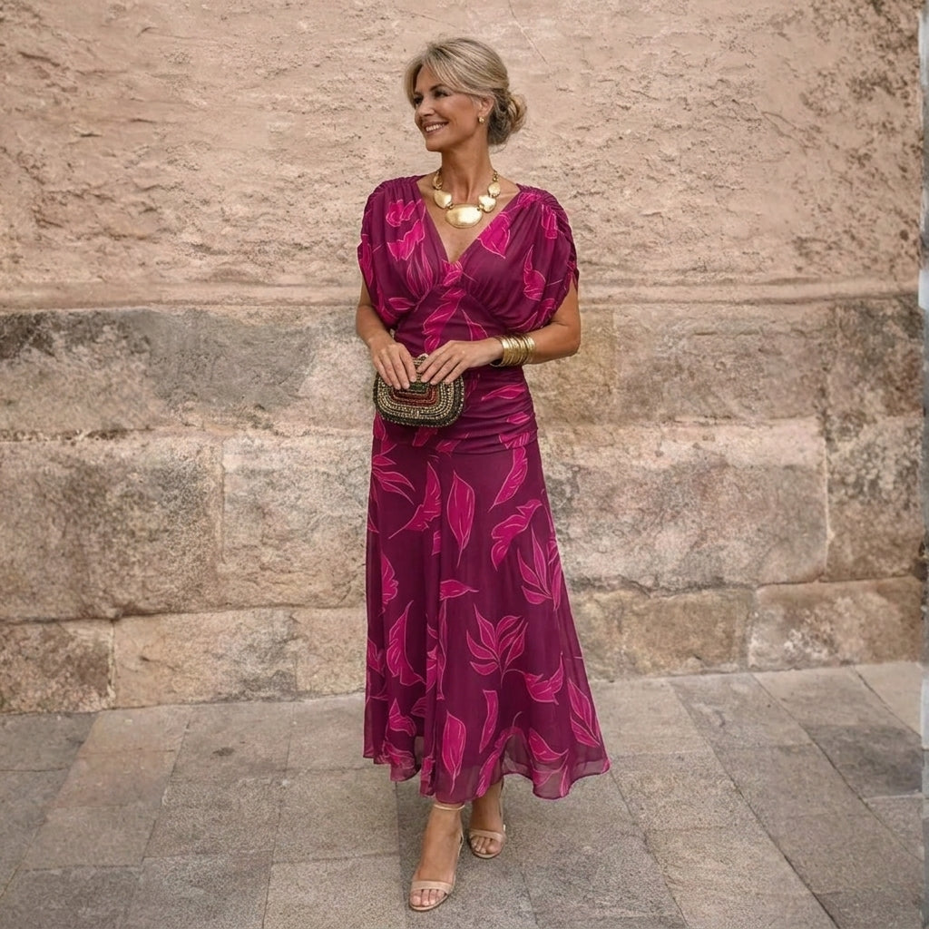 Robe longue femme Mikaela Danoir Paris à épaules dégagées, tissu fluide et élégance pour occasions spéciales.