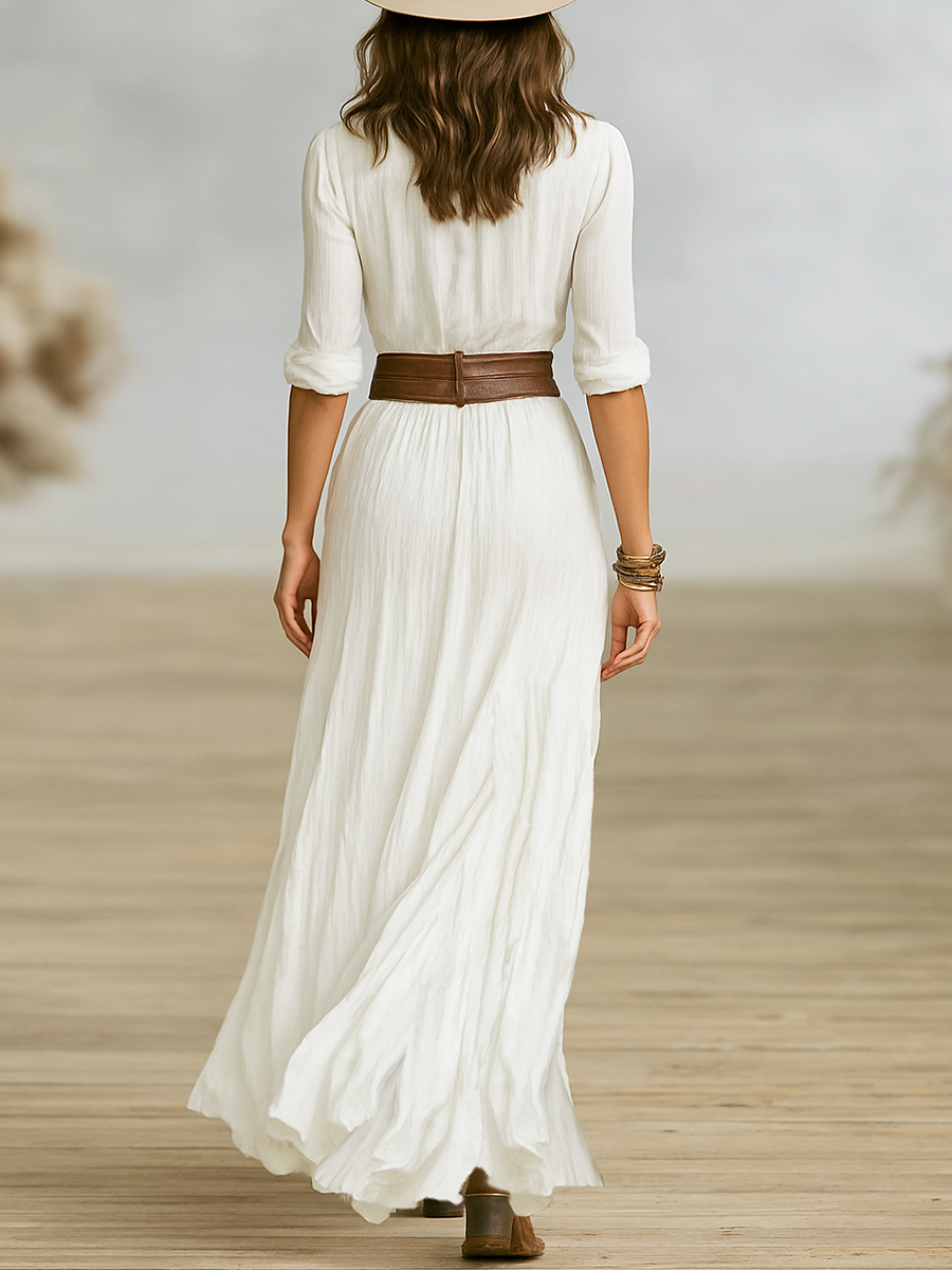 Robe longue en lin Aurore de Danoir Paris, avec col inversé, portée décontractée, coloris vert pâle, tissu léger et élégant.