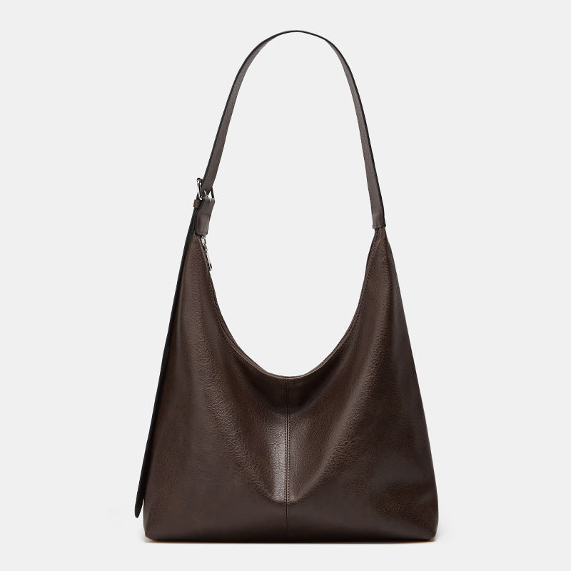 Sac à dos Danoir Paris Victoria, grand volume, polyvalent, en cuir noir avec compartiments spacieux et design élégant.