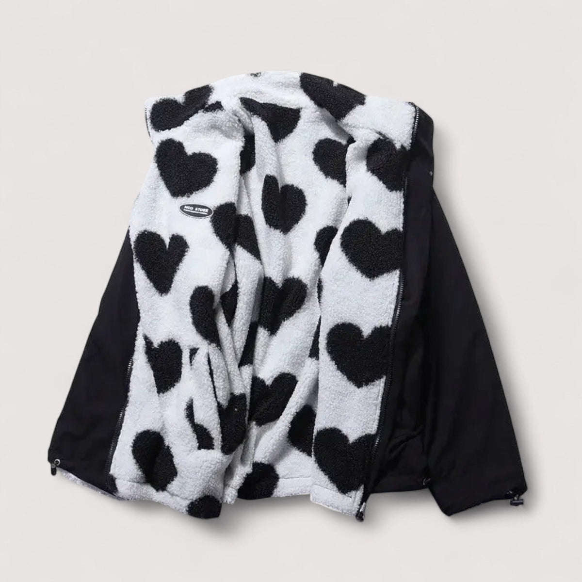 Veste réversible en forme de cœur Amélie de Danoir Paris, vue de face, détails colorés et design reversible.