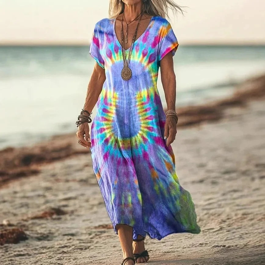Isola - Robe longue à imprimés naturels et coupe aérienne