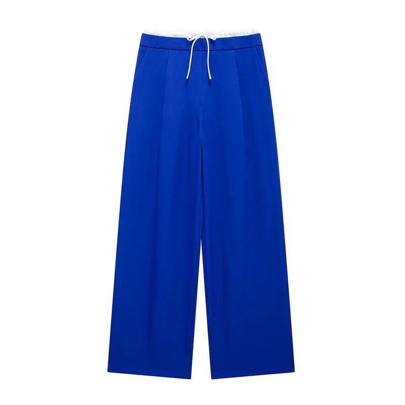 Pantalon Manon de Danoir Paris en tissu noir avec coupe classique et ceinture, vue de face sur fond blanc.