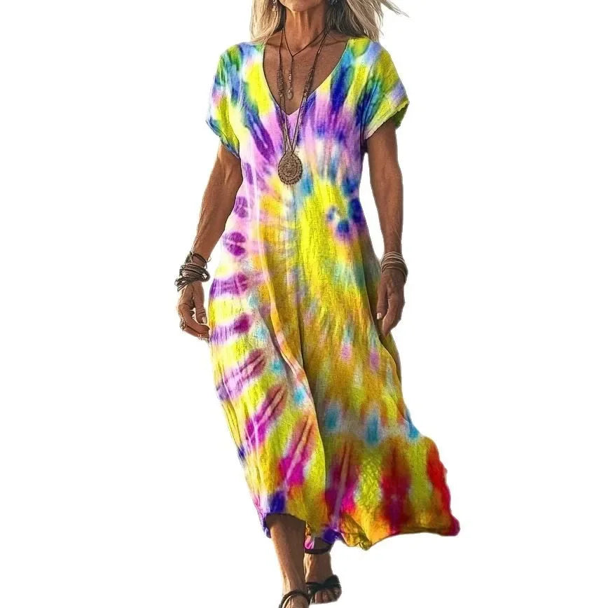 Isola - Robe longue à imprimés naturels et coupe aérienne
