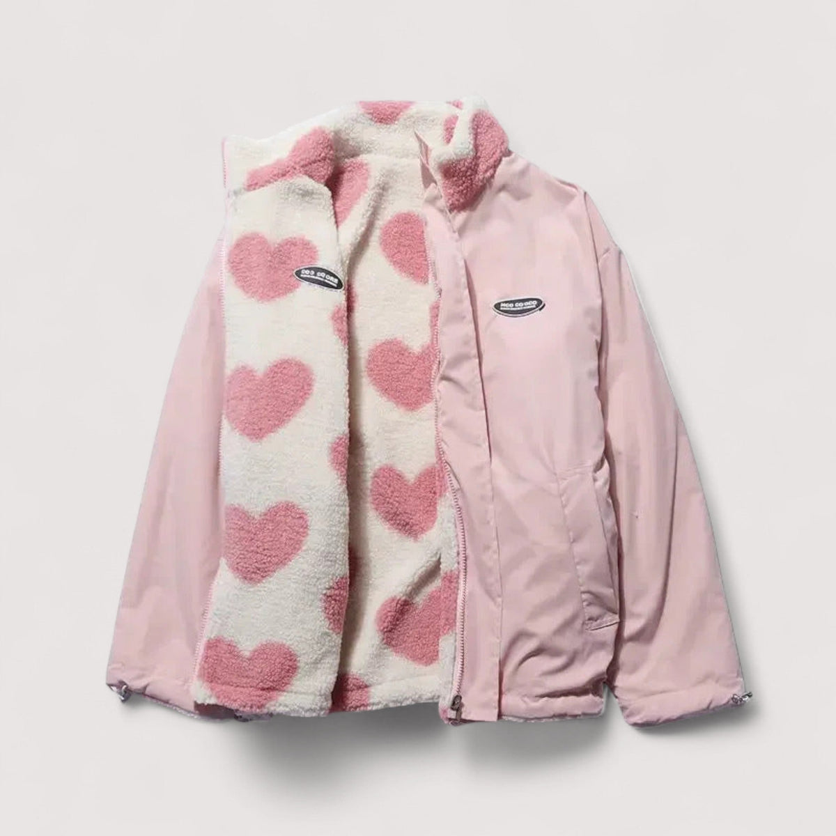 Veste réversible en forme de cœur Amélie de Danoir Paris, vue de face avec design en forme de cœur, tissu coloré et détails élégants.