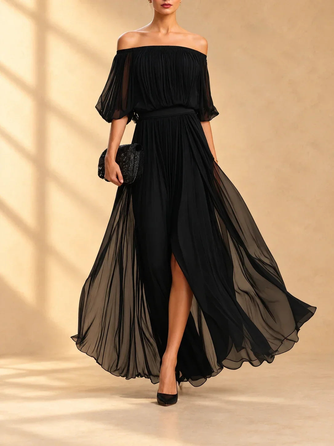Robe maxi en chiffon Geneviève de Danoir Paris avec épaules dénudées et jupe fluide, élégante et légère.