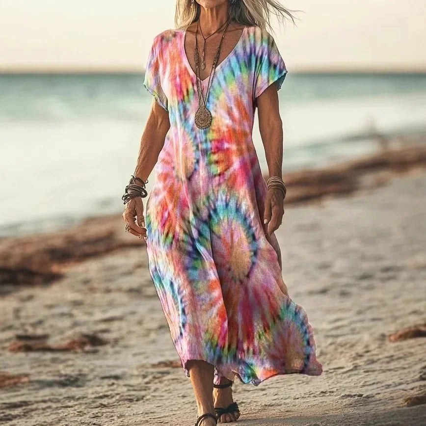 Isola - Robe longue à imprimés naturels et coupe aérienne