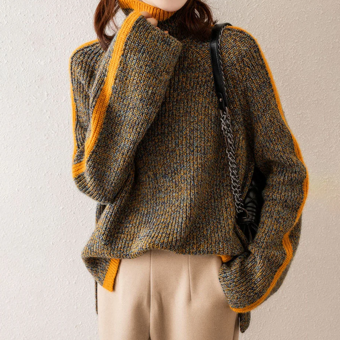 Pull Emily de Danoir Paris, élégant et confortable, en laine douce, porté sur un mannequin avec col rond et manches longues.