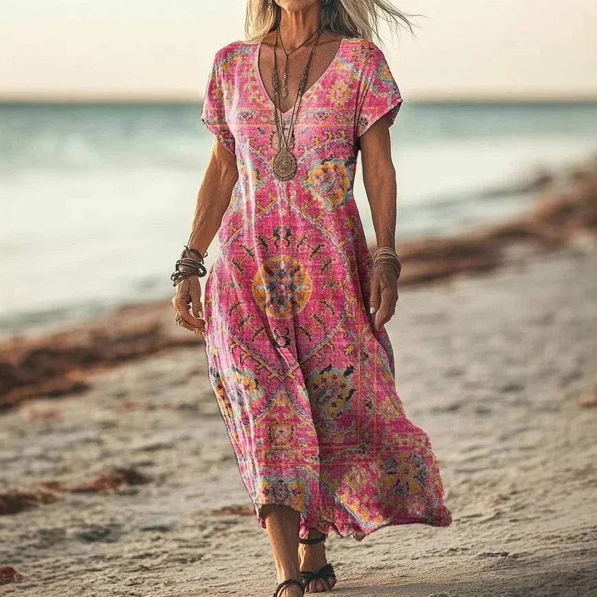 Isola - Robe longue à imprimés naturels et coupe aérienne