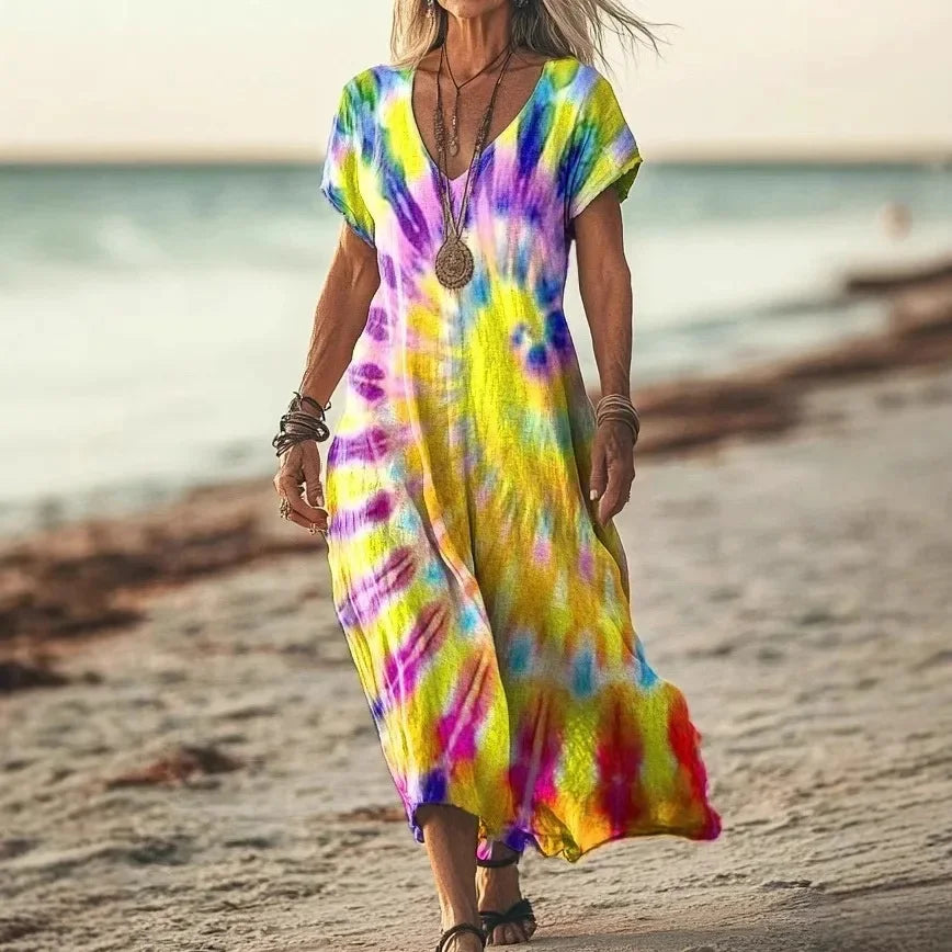 Isola - Robe longue à imprimés naturels et coupe aérienne