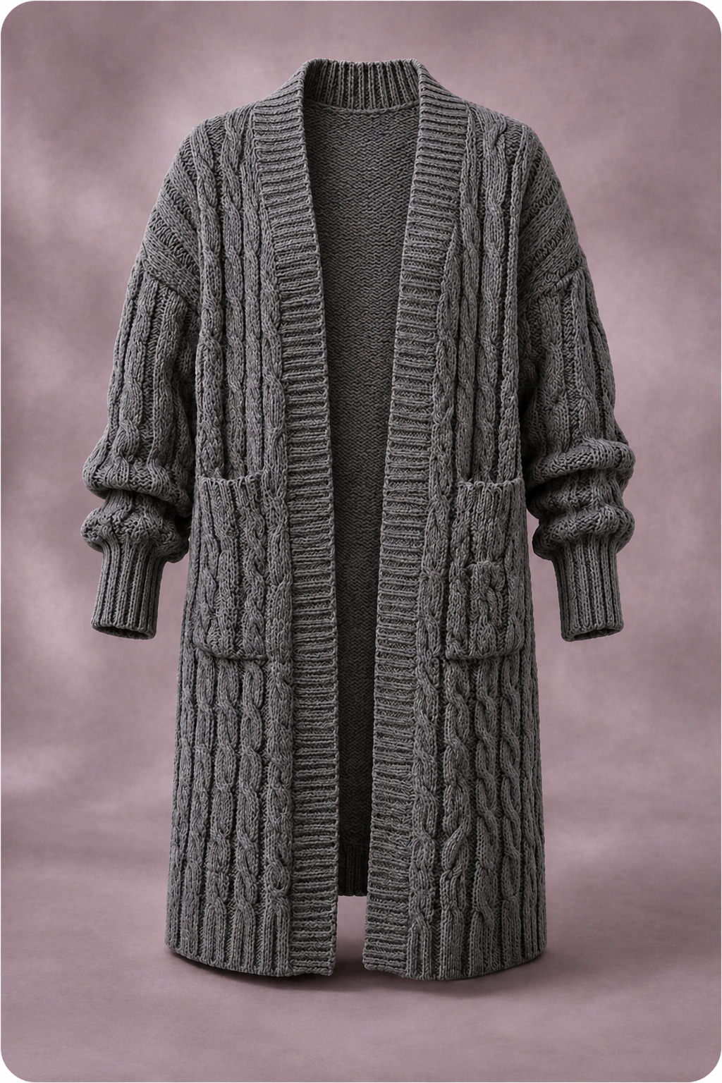Cardigan en maille à double boutonnage Danoir Paris, vue de face, avec boutons visibles et texture douce en laine.