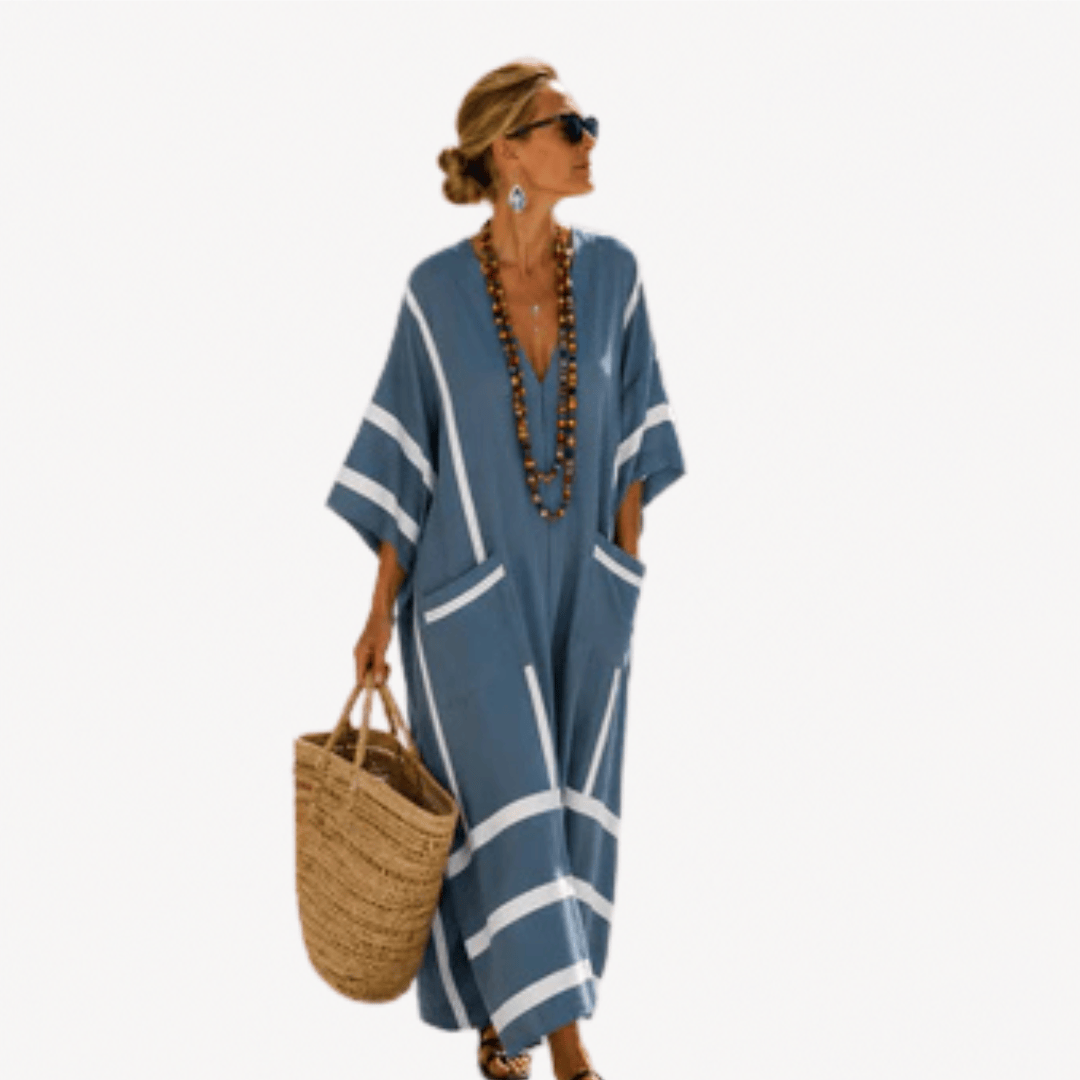 Caftán largo gris de la colección Danoir Paris, tela fluida y elegante, con detalles de diseño en la imagen.