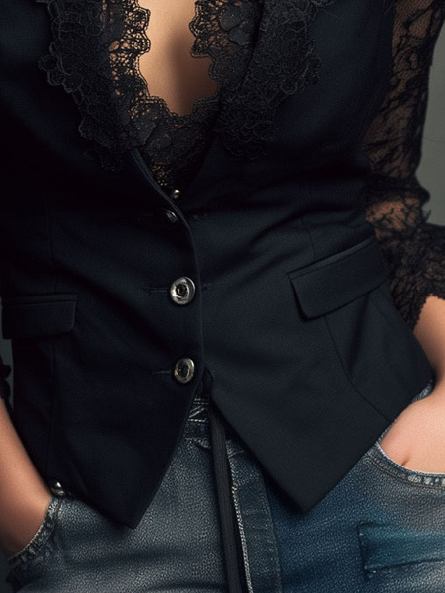 Blazer noir Noémie de Danoir Paris avec manches semi-transparentes porté sur un fond neutre.