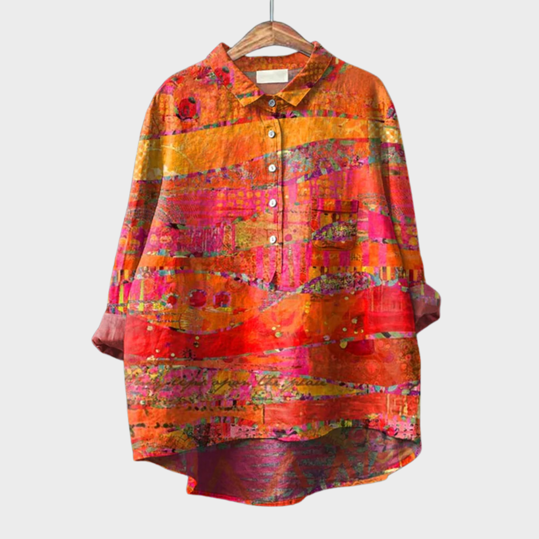 Blouse d'été en lin Catherine de Danoir Paris, élégante, orange, légère avec manches courtes, portée sur un mannequin.