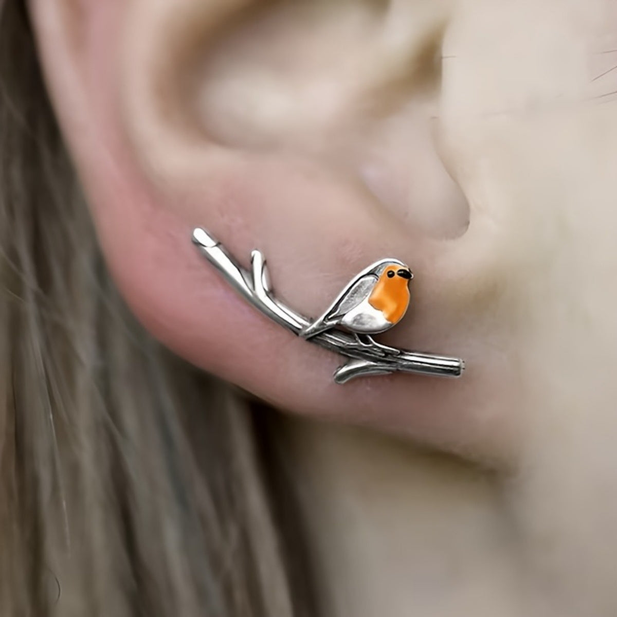 Boucles d'oreilles Danoir Paris en forme d'oiseau cartoon, détails colorés et design ludique, pour un style original et amusant.