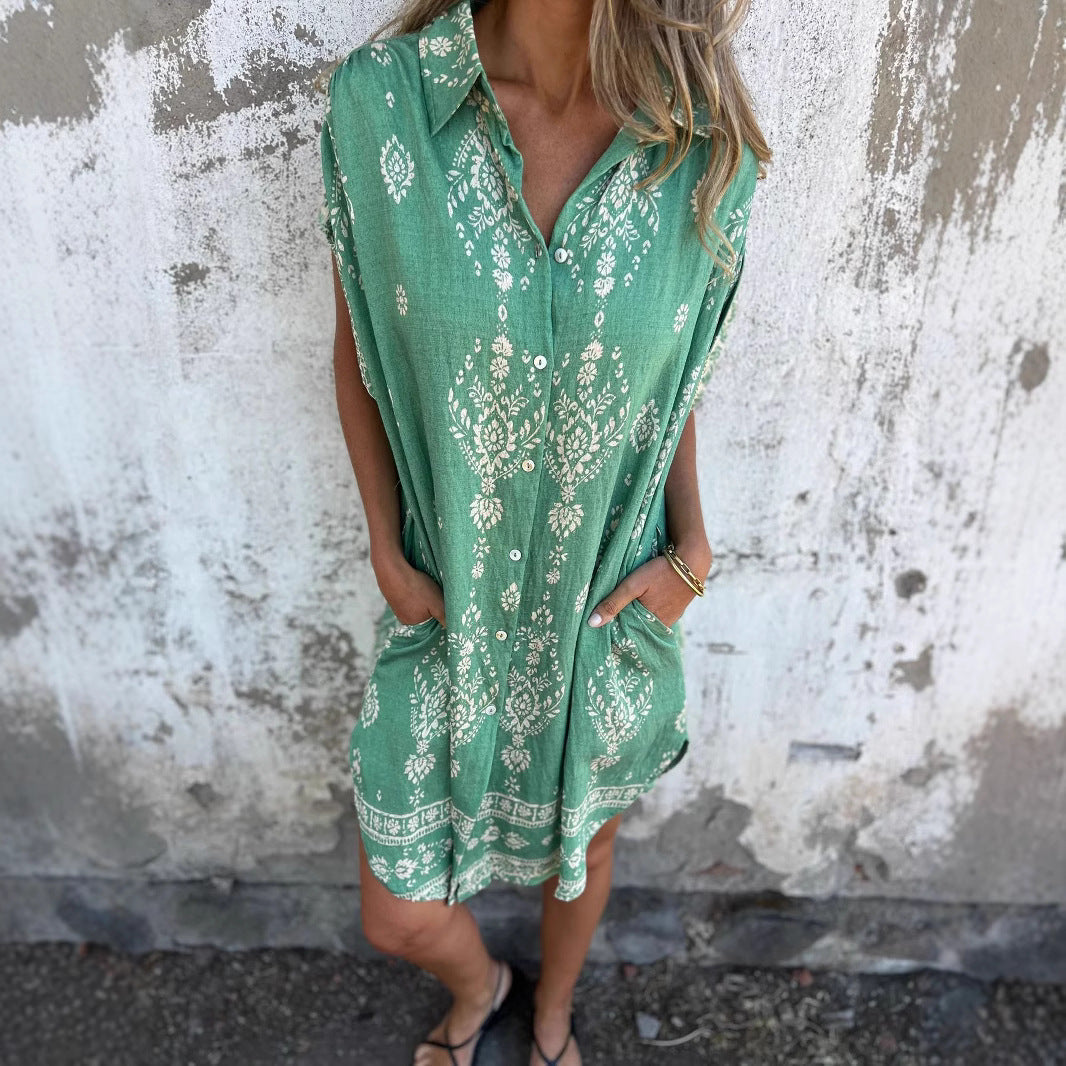 Robe ample élégante en soie Danoir Paris, silhouette fluide, tissu brillant, design sophistiqué pour occasions chics.