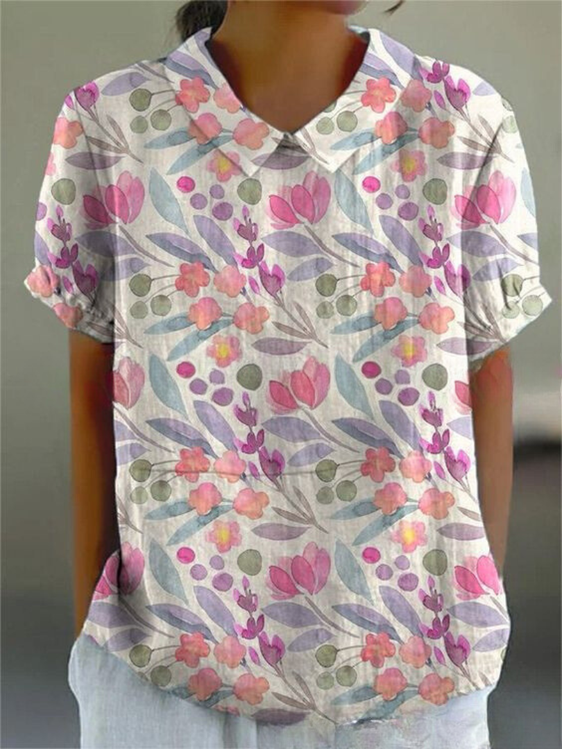 Chemise élégante Sofia de Danoir Paris avec motif floral coloré, tissu léger et coupe flatteuse pour un style chic.