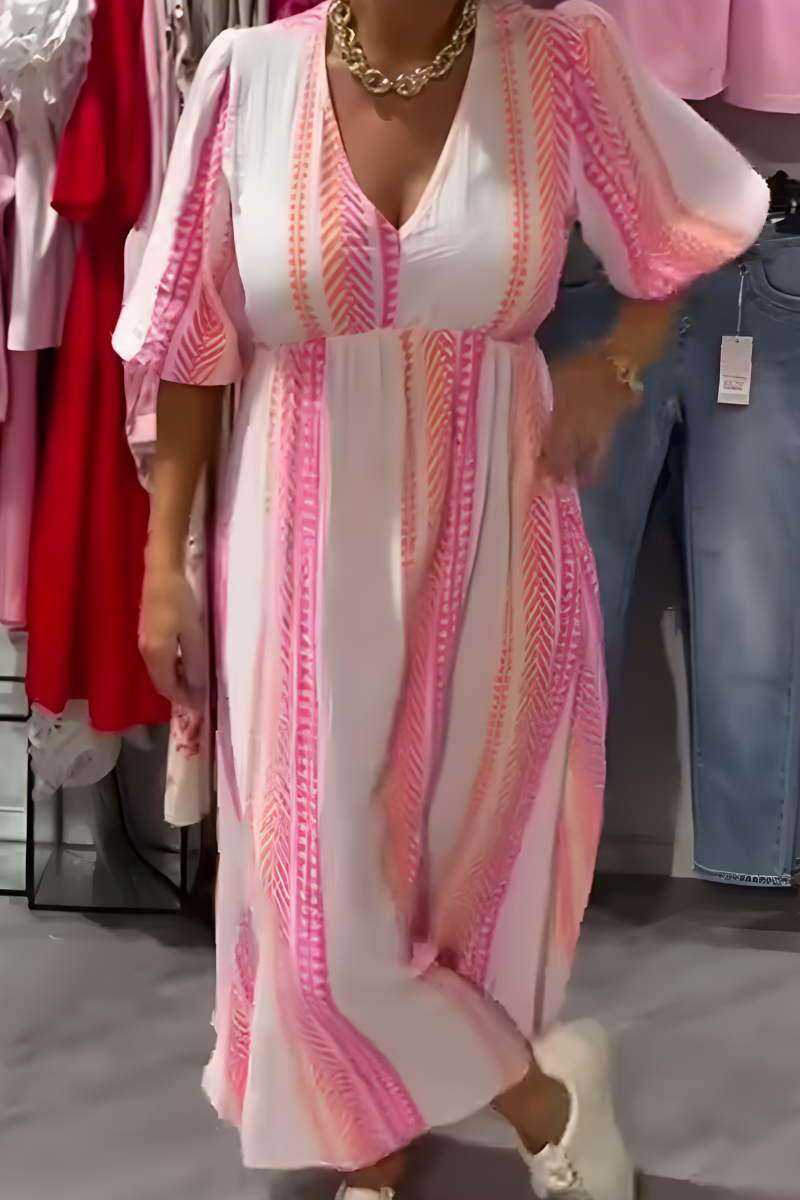 Robe d'été élégante Claudia de Danoir Paris, en tissu léger avec motifs floraux, portée sur mannequin blanc.