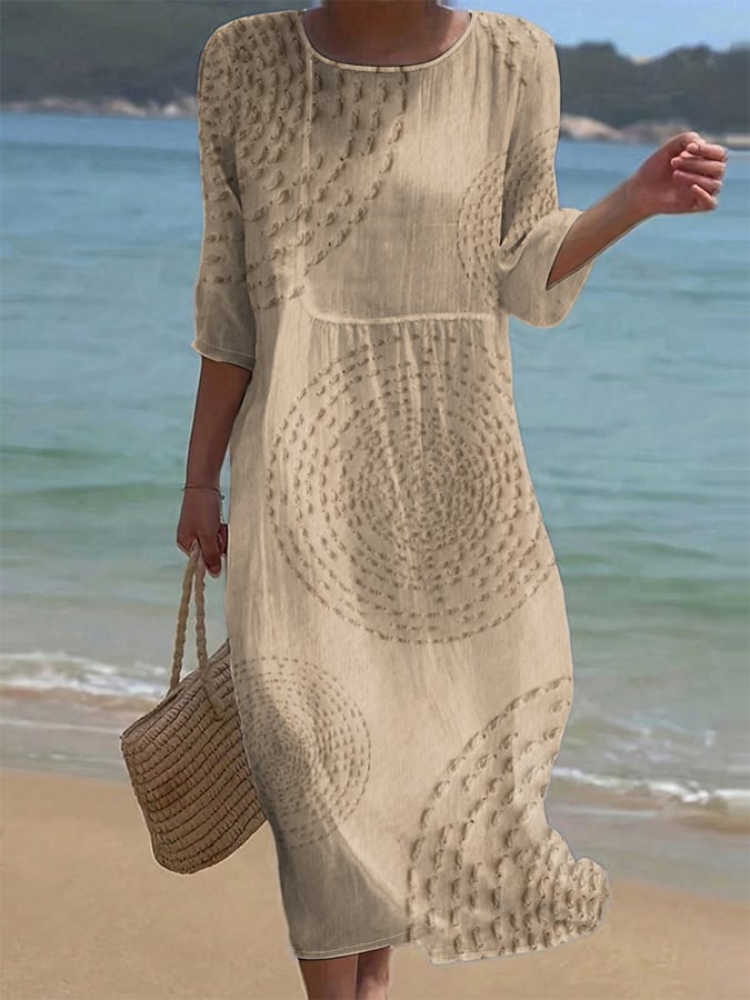 Robe midi élégante Améliane™ de Danoir Paris avec détails délicats, tissu fluide et coupe sophistiquée visible sur l'image.
