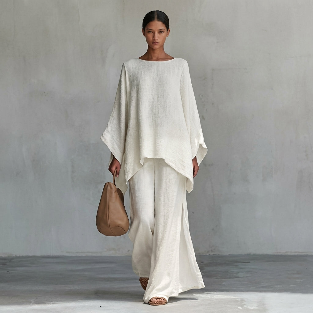 Ensemble deux pièces Danoir Paris Christine avec manches longues et pantalon large, vêtement blanc élégant pour femmes.
