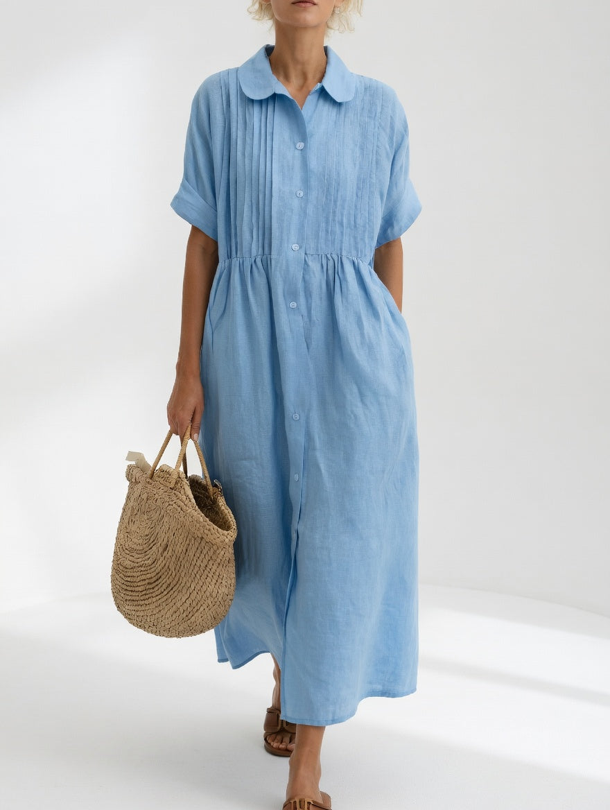 Robe chemise fluide estivale Lysandra™ blanche de Danoir Paris, légère et élégante, portée en été.
