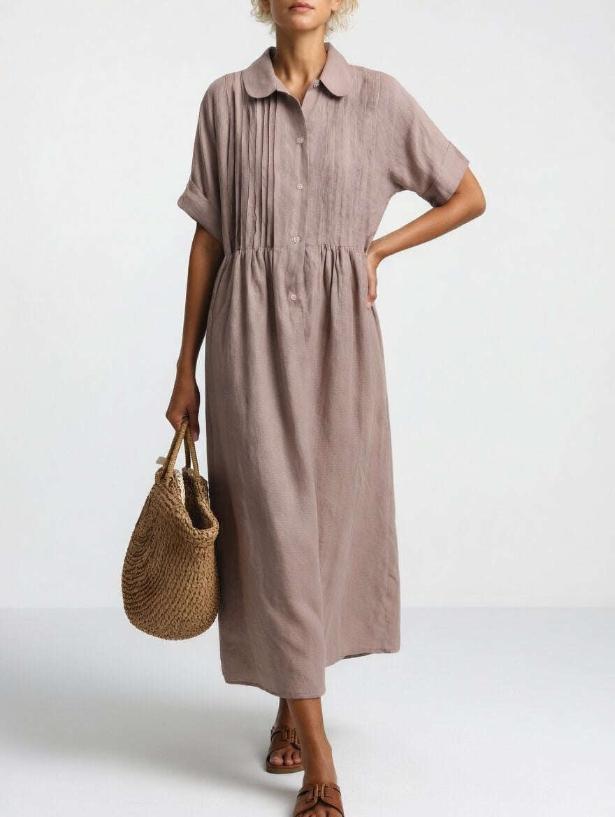 Robe chemise fluide estivale Lysandra™ de Danoir Paris en tissu léger blanc, décontractée et élégante pour l'été.