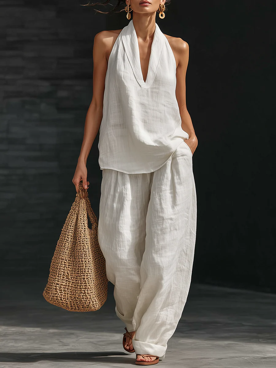Vêtement d'ensemble sans manches et pantalon large Zoë™ de Danoir Paris, look élégant en tissu léger et fluide.