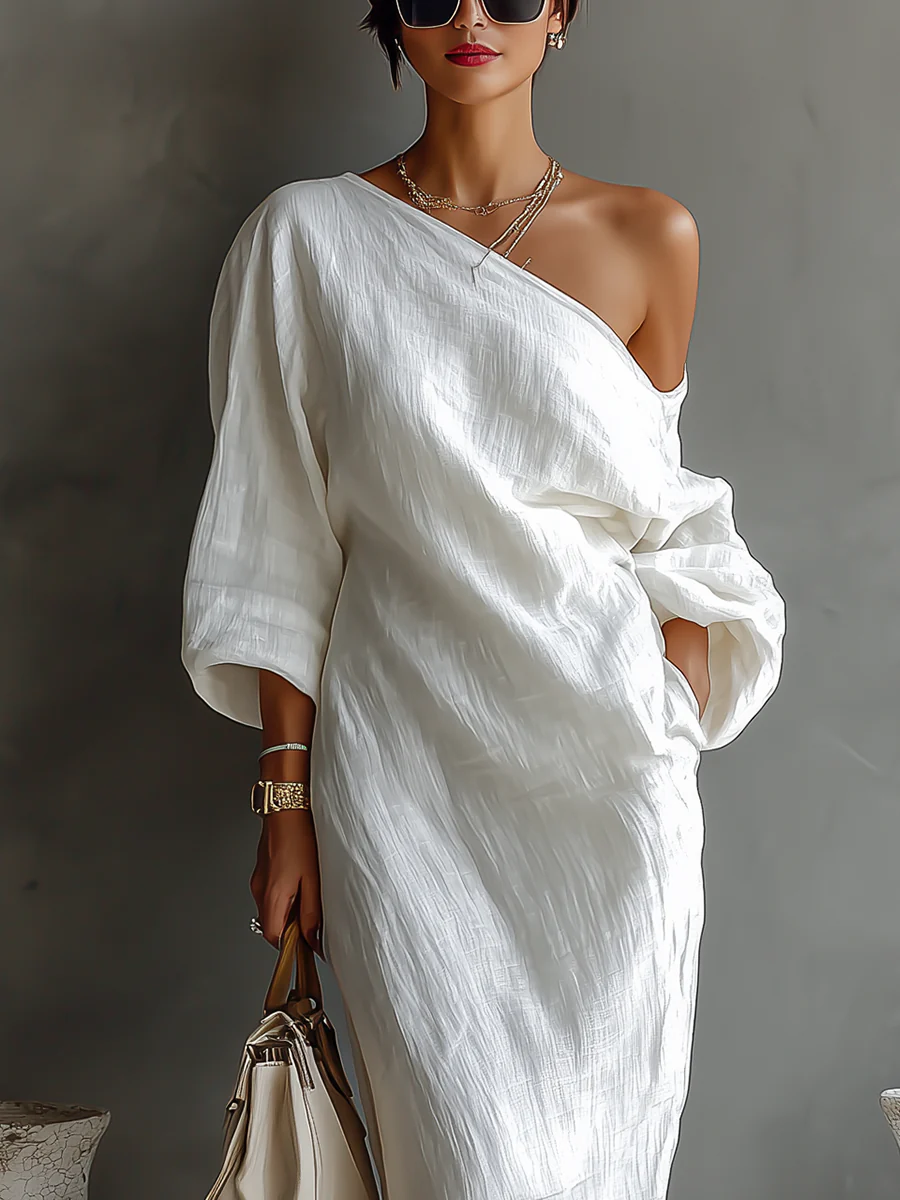 Robe maxi asymétrique élégante Elise™ de Danoir Paris, tissu fluide et design sophistiqué, vue de face sur mannequin.