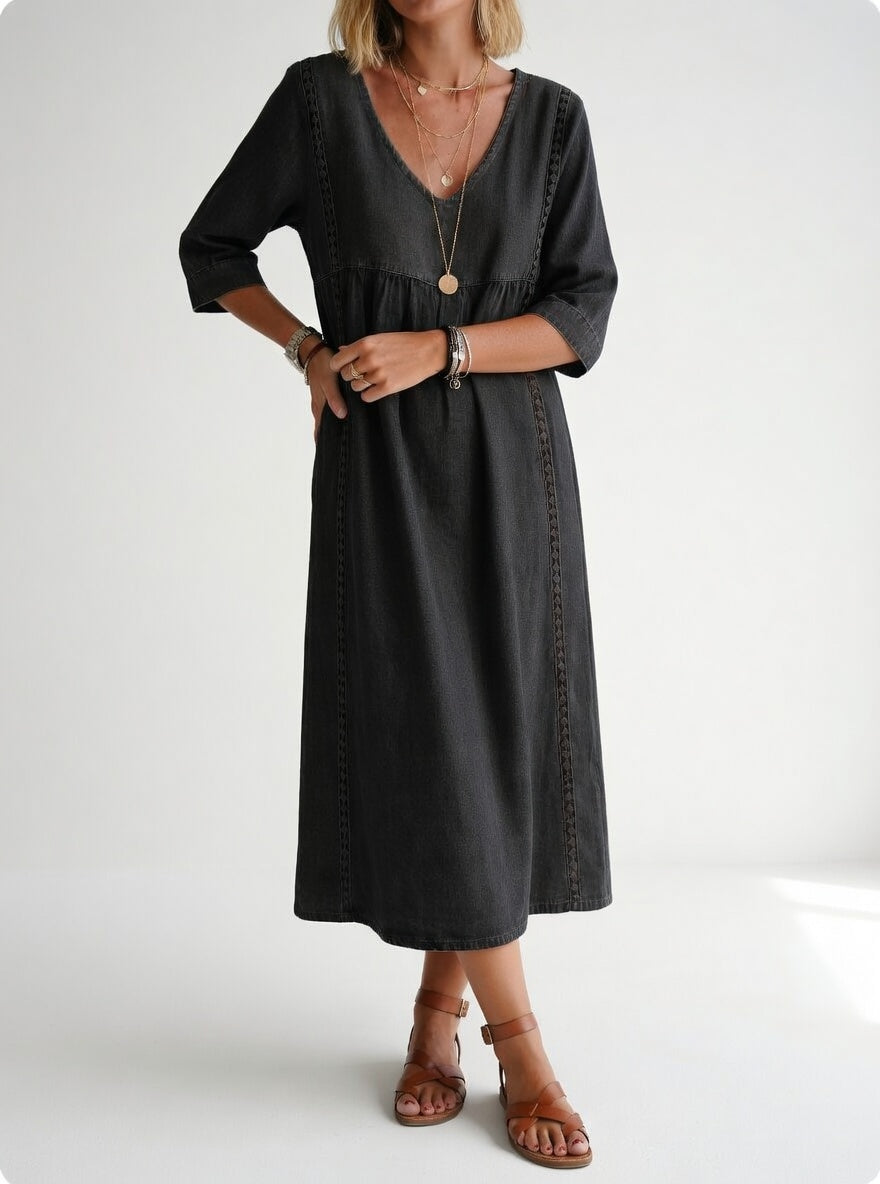 Robe midi fluide décontractée élégante Lioréa™ en noir, style sophistiqué et confort, de Danoir Paris.