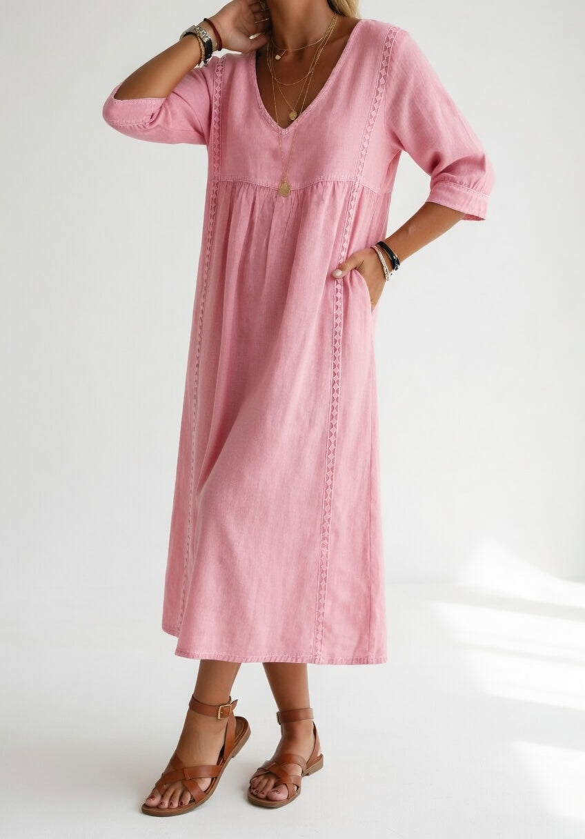 Robe midi fluide décontractée élégante Lioréa™ rose de Danoir Paris, tissu léger et coupe confortable visible sur l'image.