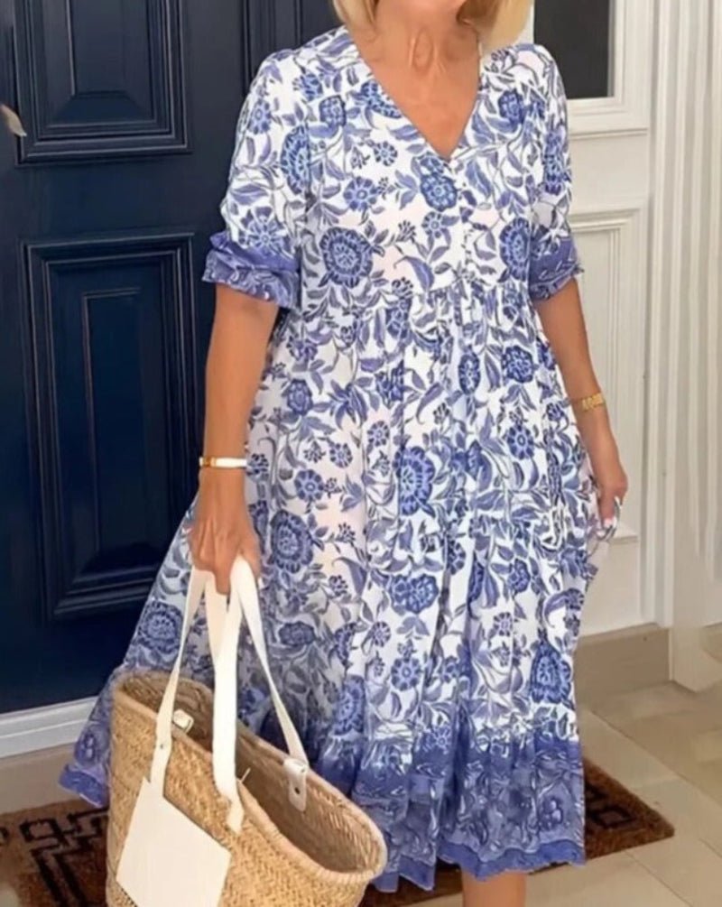Robe d'été élégante Danoir Paris en tissu léger avec design fluide et couleurs vives, idéale pour la saison estivale.