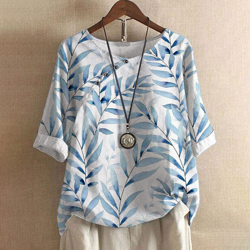 Blouse printanière Claudine de Danoir Paris, élégante avec motifs floraux, manches longues et col en V, portée décontractée.