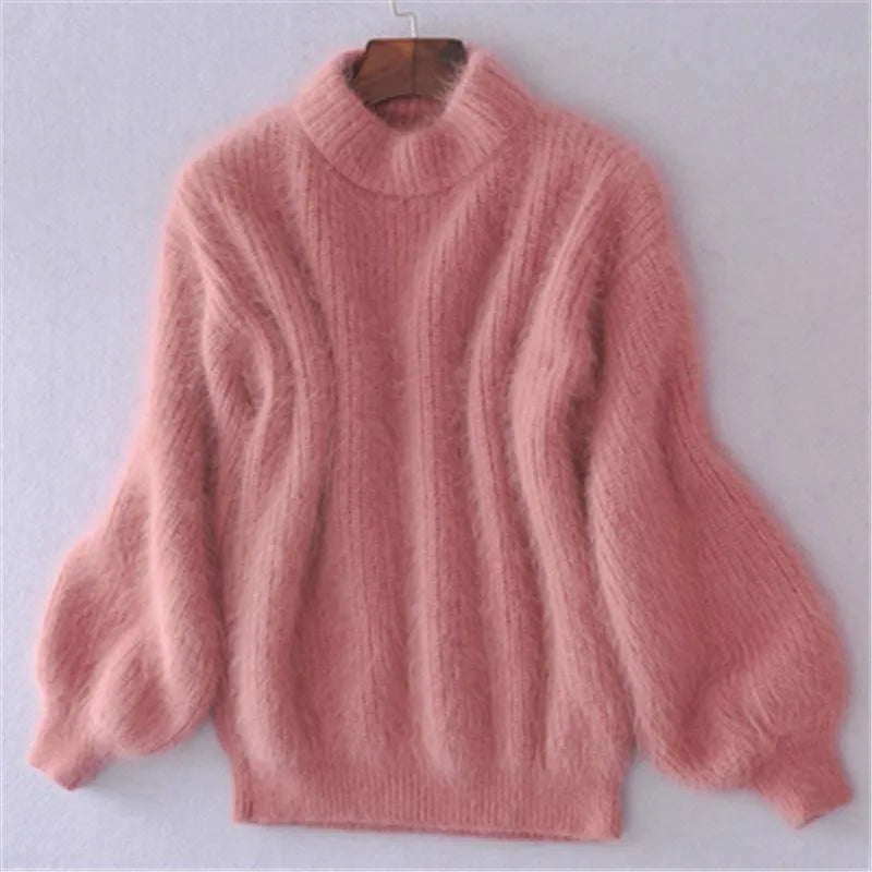 Pull roulé élégant froid Jessica de Danoir Paris, en maille bleue avec col montant et détails raffinés.