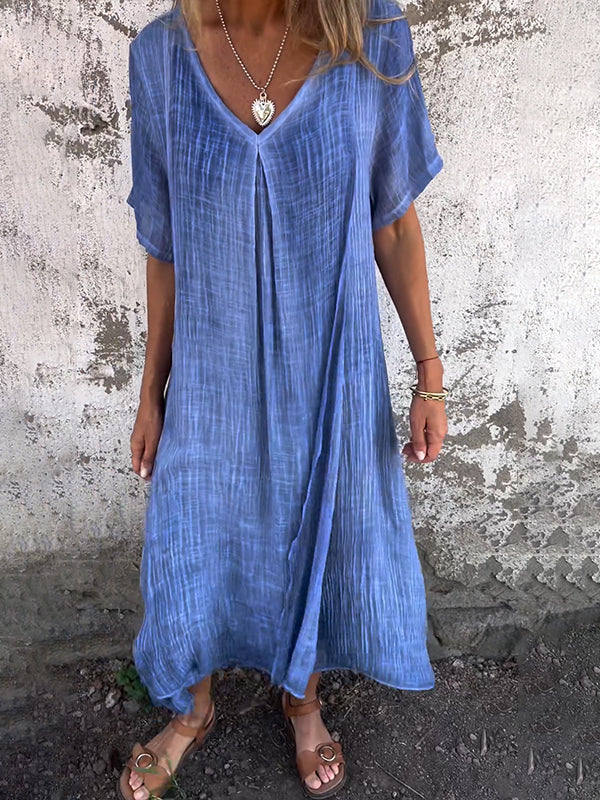 Robe écologique élégante Malaga de Danoir Paris, tissu fluide et coupe sophistiquée, portée avec accessoires en image.
