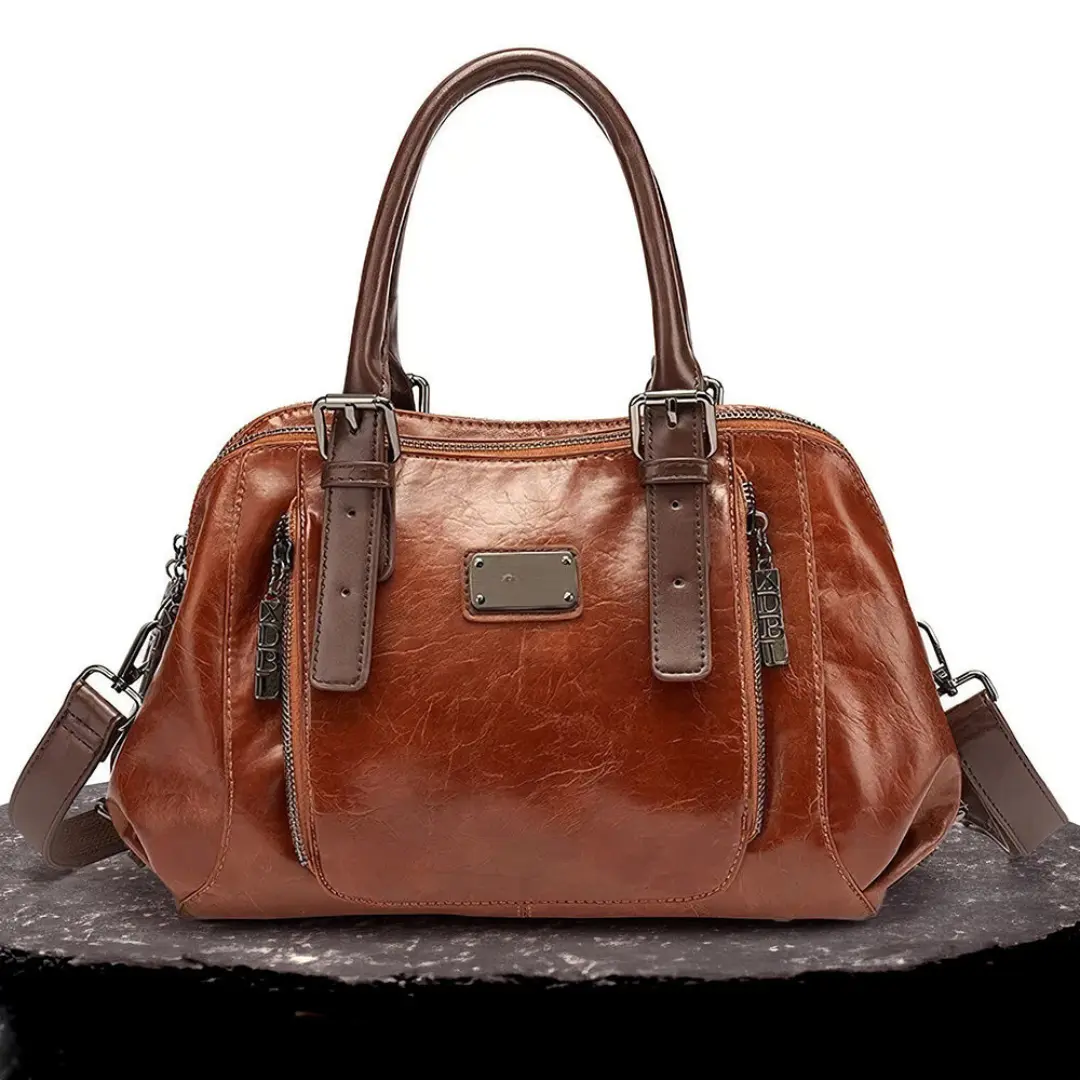 Sac à déclaration Silke Danoir Paris en brun, élégant sac Heritage avec détails sophistiqués, pour un style raffiné.