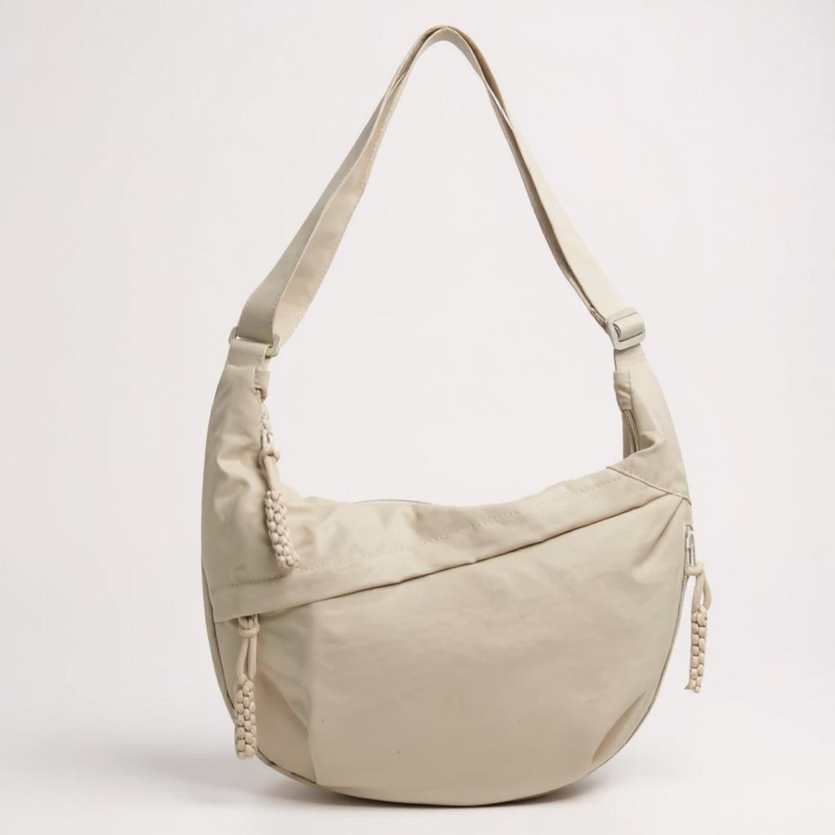 Sac à épaule Elena Danoir Paris beige en cuir avec poignées et détails élégants, vue de face.