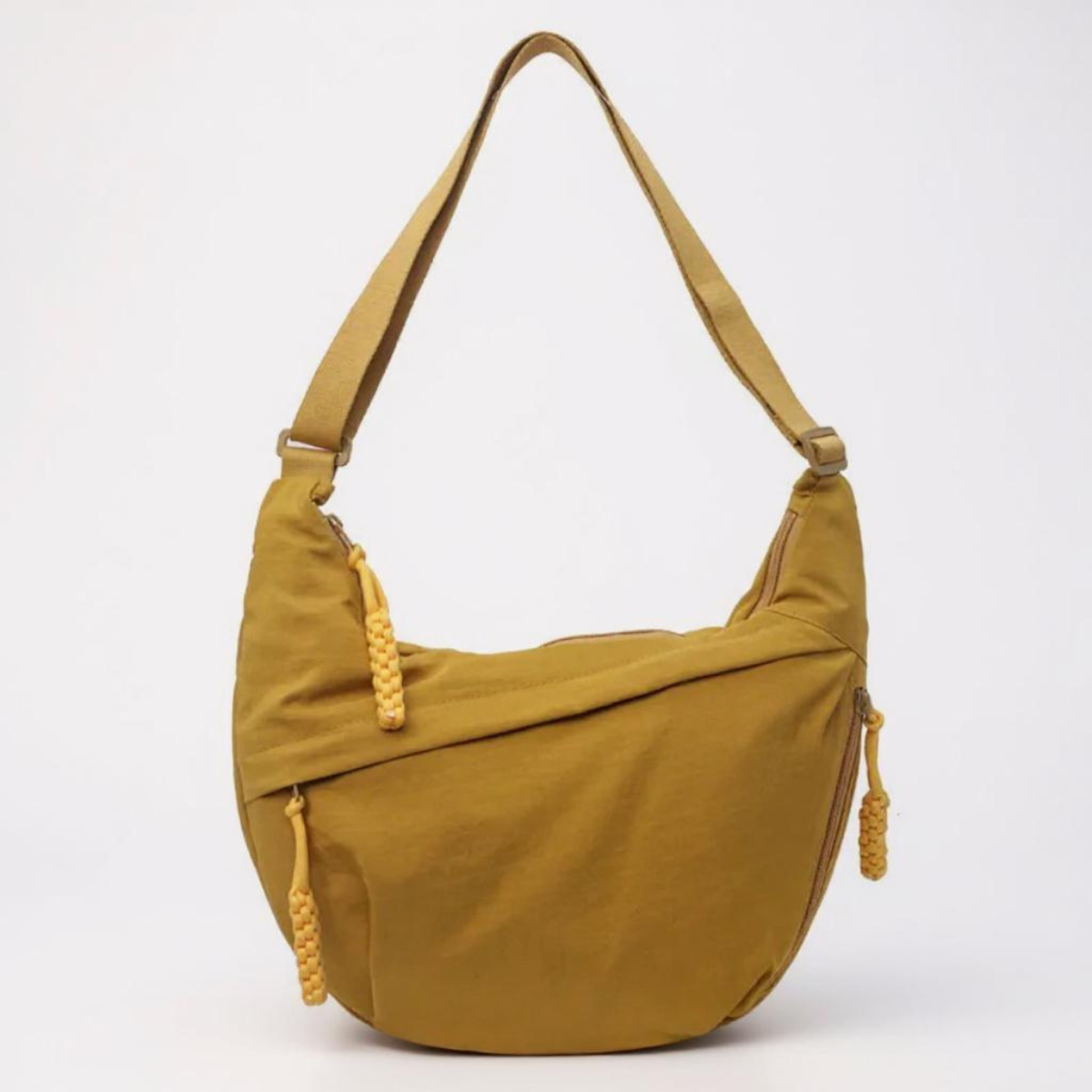 Sac à bandoulière Danoir Paris Luce en coloris ocra avec fermeture élégante et poches pratiques pour un style chic et fonctionnel.