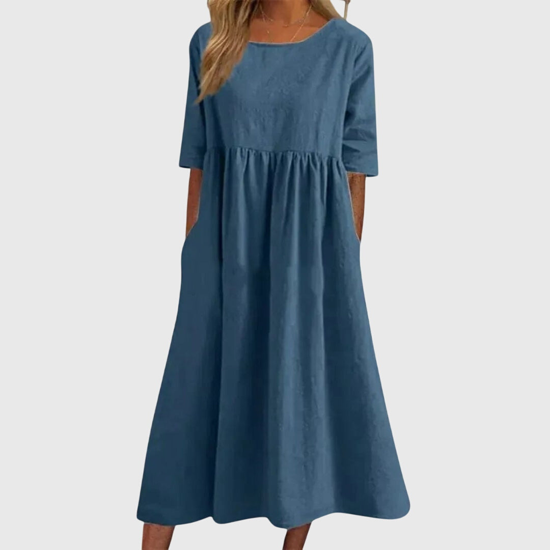 Robe élégante Danoir Paris Ariette™ en tissu fluide, coupe flatteuse pour toutes les occasions, style sophistiqué et moderne.